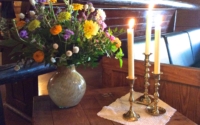 Vintage Candle Holders with Flowers on Table