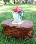 Vintage Picnic Basket with Doily and Flowers