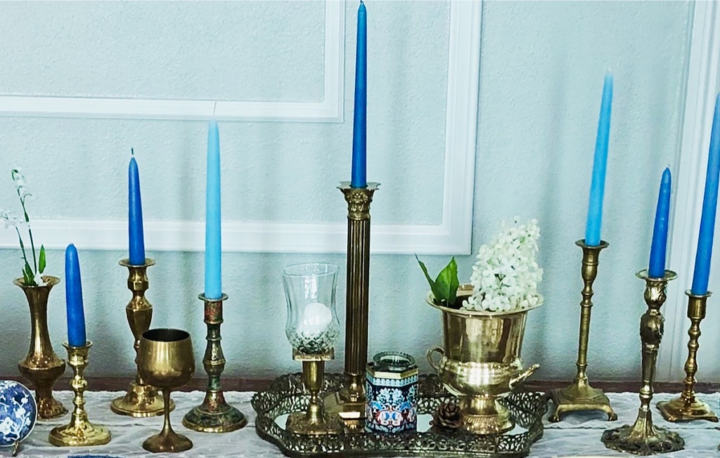 Assorted Brass Candleholders with Blue Candles