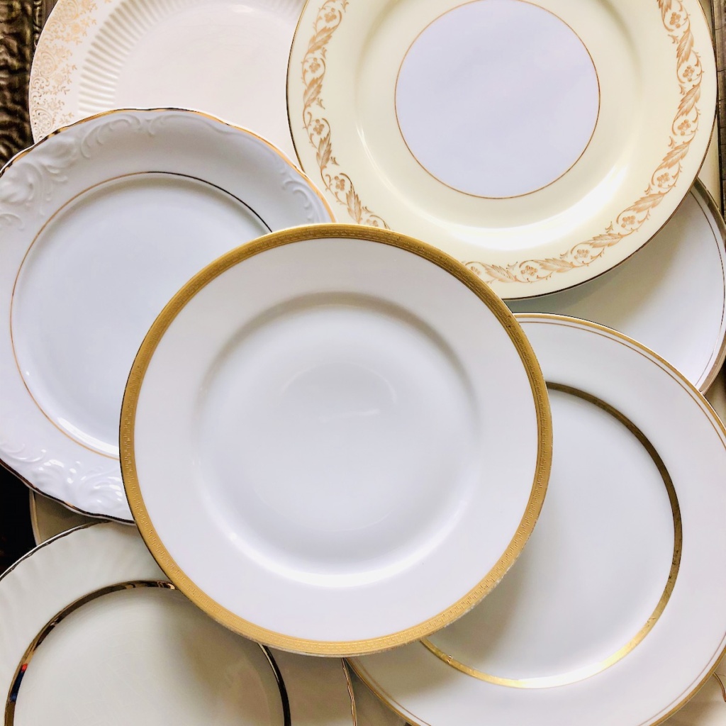 Vintage white/cream plates with gold