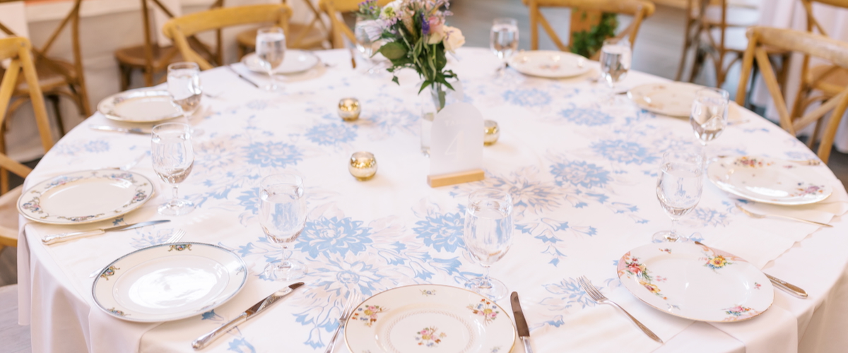 Vintage Reception Tables with Vintage Printed Tablecloths